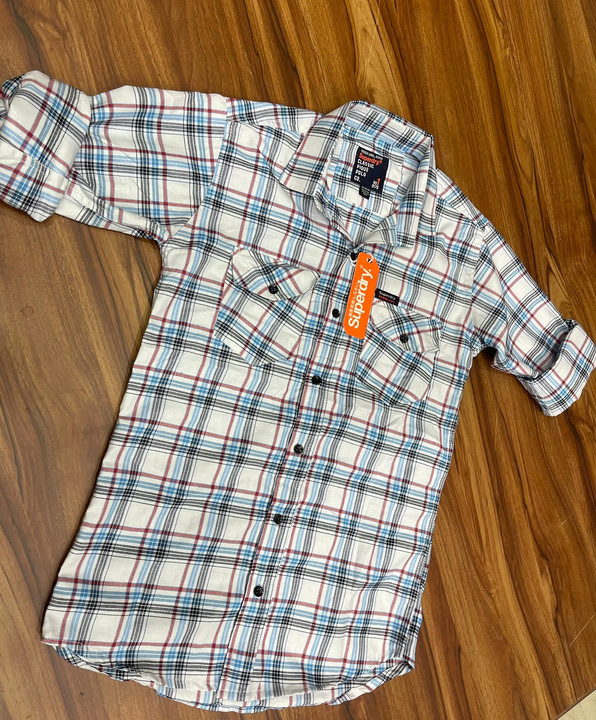 Check shirts uploaded by business on 5/5/2023