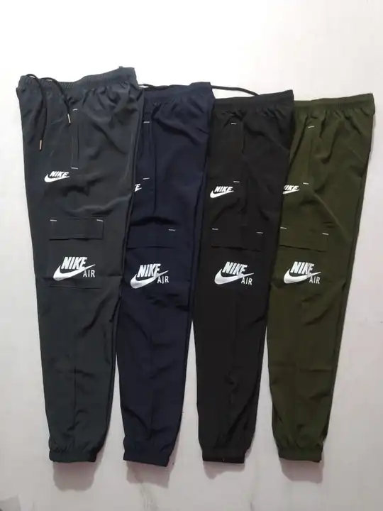Nike Cargo joggers design 
Ns 8%lycra fabric
Size Mto xl
Colour black Navy dark grey olive and red a uploaded by Rhyno Sports & Fitness on 5/7/2023