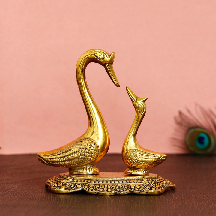 Golden Metal Loving Swan Couple Decorative statue  uploaded by Home decor on 5/8/2023