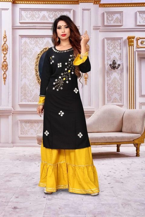 Post image *MK - QUALITY GUARANTEED*
(MOST wellcome reseller contact number:- 8866823089)
*MIRROR WORK HIT DESIGN*

*KURTI &amp; SHARARA*

*KURTI :- 14 KG HEAVY REYON WITH MIRROR WORK PLUS HAND WORK AND UMBRELLA TYPE SLEEVES*

*SHARARA :- 14 KG HEAVY REYON*

*FULL STITCHED*

*SIZE* :-  *XL , XXL*
 *MK KURTI*
 *RATE ONLY :-

*SINGLE PIS AVAILABLE*