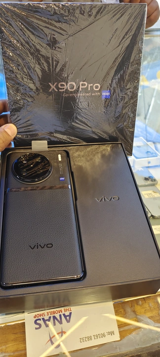 Vivo x90pro 12)256 black only sealopen fullkit withbill indian billamount 85000  uploaded by Anas trading co on 5/9/2023