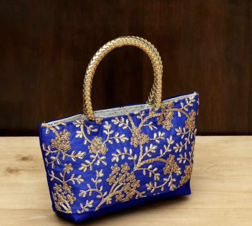 Handbag with embroidered designs  uploaded by business on 5/11/2023