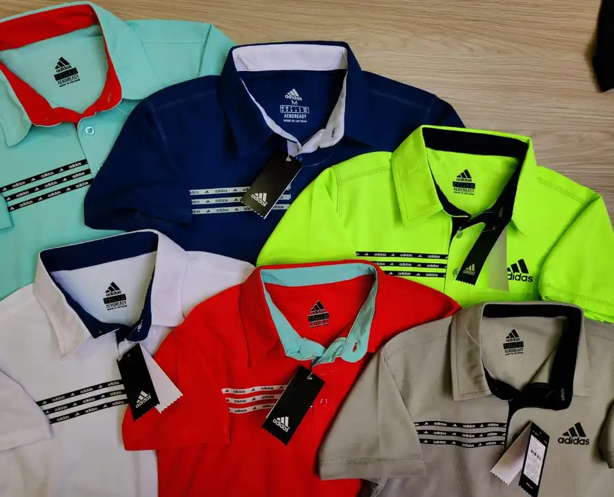 Post image *_PREMIUM QUALITY COLLAR TSHIRT* 
 
_*ADIDAS STRIPES PREMEIUM  COLLAR TSHIRT*_

 _FABRIC - *BABY PIQUE LYCRA.. WITH" *210-220* " GSM_
_SIZE - *M,L,XL*
_MOQ- *64(60+4)*_
_PRIZE - *215*_

*5 THREAD STITCHING HIGH QUALITY STICKERS USED* 
*ORGINAL PRIZE TAG WITH 2299*
  
 *_GOODS READY FOR DELIVERY_*