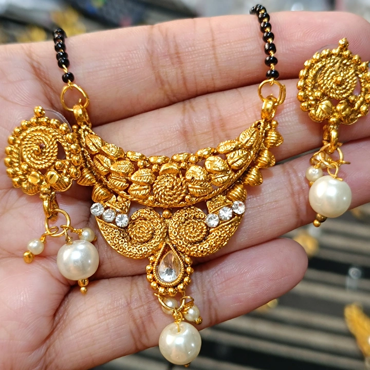 Mangalsutra with earrings uploaded by business on 5/12/2023