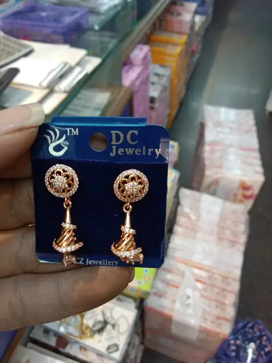ORIGINAL DC AD EARRINGS uploaded by business on 5/14/2023