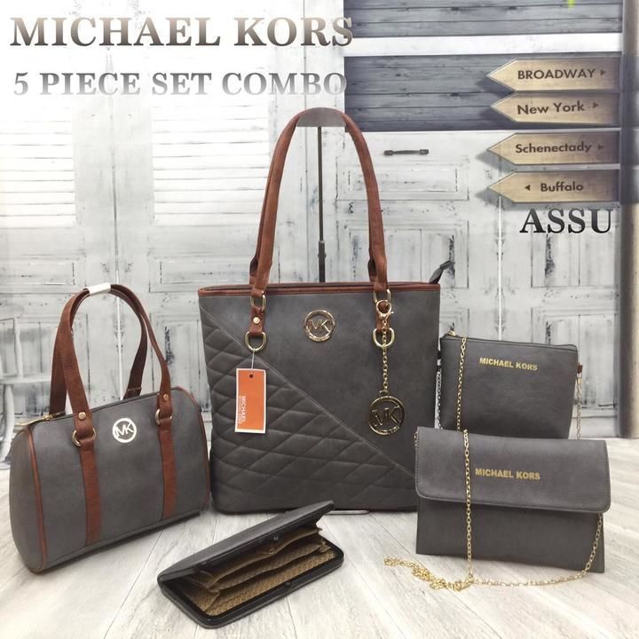 *MICHAEL KORS *(1st Copy)
5 pc combo
With mk key chain 
Awesome quality 
Size 10/12 uploaded by Rakesh Textiles on 3/10/2021