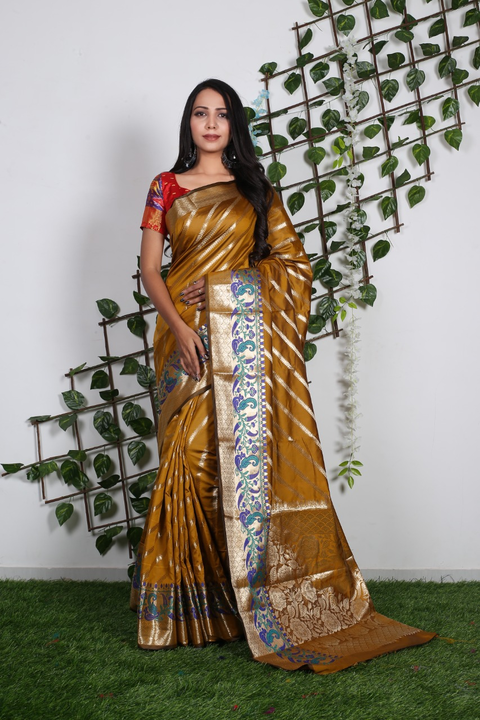 *🛍ARONICA  🛍*
Murti 
Soft Lichi  Silk Saree With Rich Gold Zari Wooven Pallu & Zari weawing Border uploaded by Divya Fashion on 5/16/2023