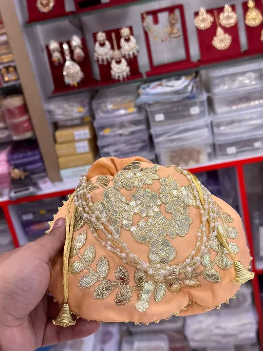 Potli bag uploaded by Taha fashion online store on 5/17/2023