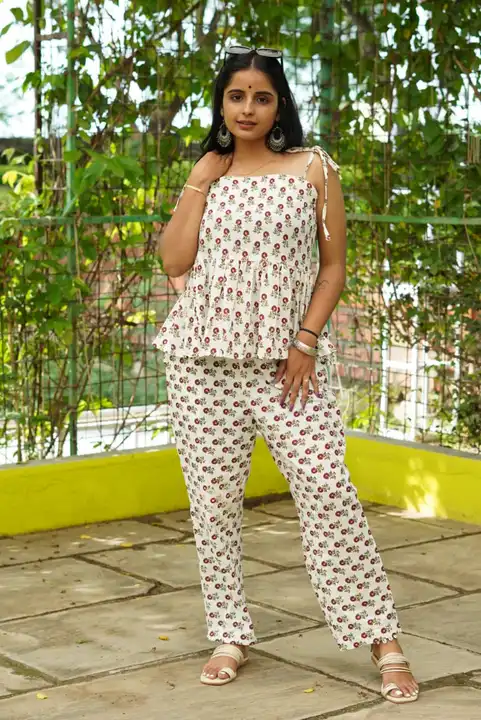 *This co-ord set of 2 includes a top & flared bell pants*
*Top is sleeveless with tie ons*
*Pants  uploaded by Shree Hand Printed Industries on 5/18/2023