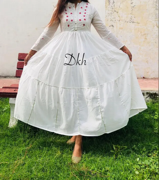 *White Full flair Bell salves Gown in soft Reyon in Tier pattern with mulmul lining*

*With gotta la uploaded by JAIPURI FASHION HUB on 5/18/2023