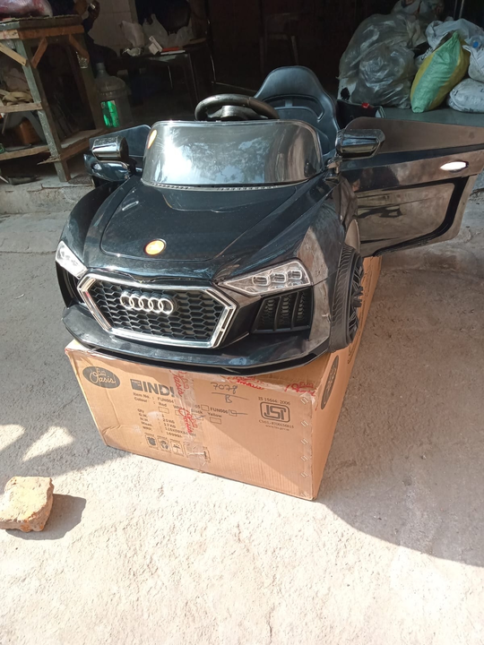 Metallic Audi car with wheel lights uploaded by business on 5/20/2023