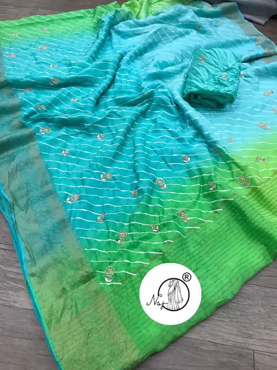 presents trending Lehriya saree


🥰🥰big sele pure rusyan silk with beautiful multy colours full za uploaded by Gotapatti manufacturer on 5/21/2023