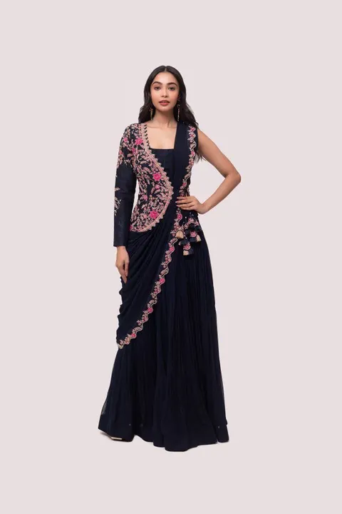 (Pre Draped Lengha Saree
Fabric Description )
*Crop Top* : Stitched Georgette Fabric Top
*Size* XL u uploaded by Roza Fabrics on 5/21/2023