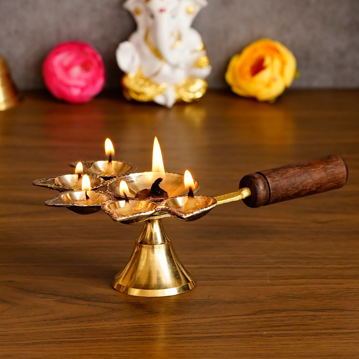
🪔Golden Brass Panchdeep Diya for 5 Cotton Wicks With Wooden Holder🪔
 uploaded by Home decor on 5/23/2023