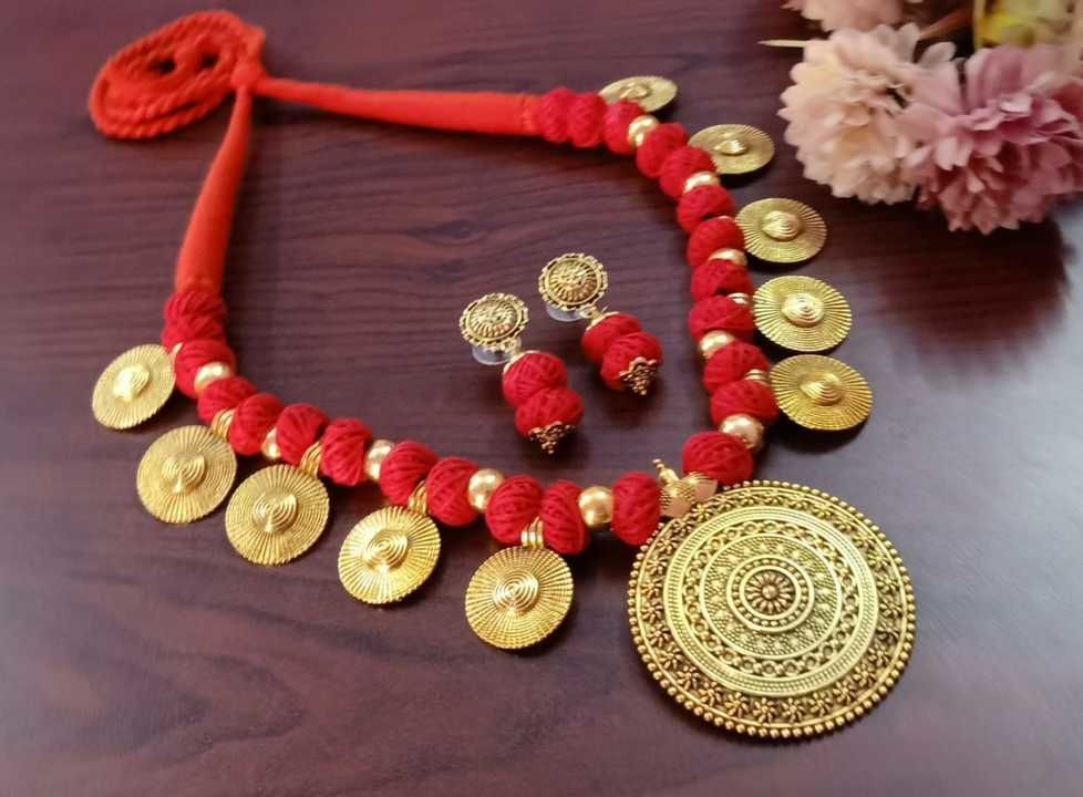German Silver Round pendant with coin thread dori ball necklace set uploaded by Sandhya fashion jewellery on 3/11/2021