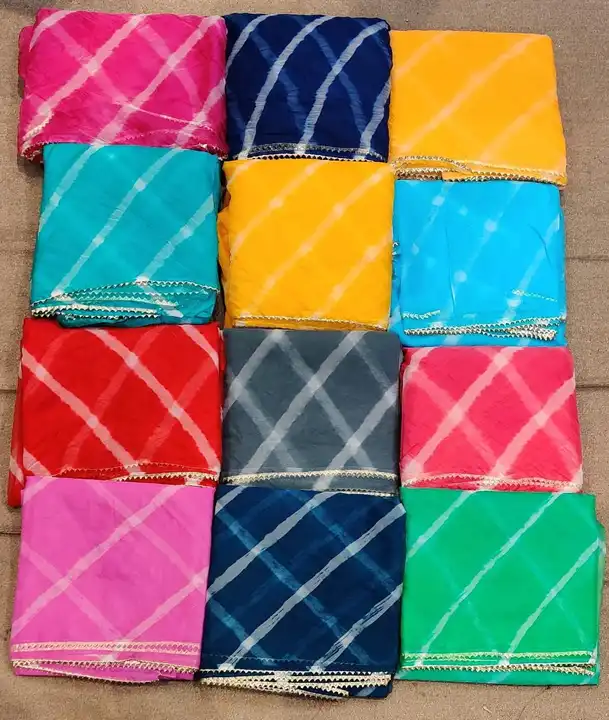 Ourganja fabric lehriya whit bijiya lace uploaded by Narayan and sons jaipur rajasthan india on 5/25/2023