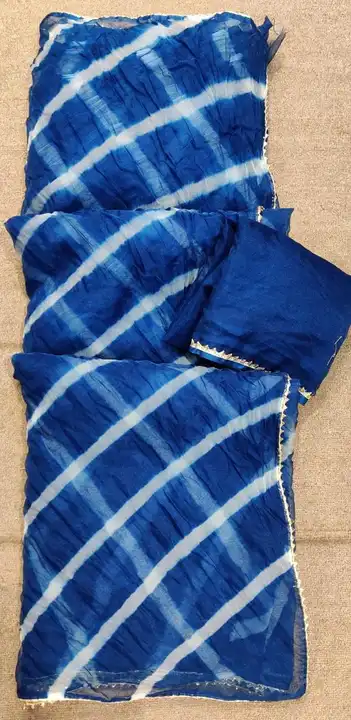 Ourganja fabric lehriya whit bijiya lace uploaded by Narayan and sons jaipur rajasthan india on 5/25/2023