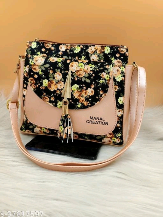 Post image ROZY COLLECTION Handbag For Women And Girls | Ladies Purse Handbag | Woman Gifts | Women Shoulder Bags | Side Handbags | Wedding Gifts For Woman | Women Designer Bags | Travel Purse Handbag
Name: ROZY COLLECTION Handbag For Women And Girls | Ladies Purse Handbag | Woman Gifts | Women Shoulder Bags | Side Handbags | Wedding Gifts For Woman | Women Designer Bags | Travel Purse Handbag
Material: PU
No. of Compartments: 2
Pattern: Solid
Type: Handheld
Net Quantity (N): 1
Sizes:Free Size (Length Size: 12 in, Width Size: 3 in, Height Size: 14 in) 

Carry with Style ROZY COLLECTION slings are fabricated with utmost proficiency by our skilled experts, highlighting each diminutive detail with perfection. The superior quality material used adds durability to it and makes it sturdier. This spacious bag has enough room to accommodate all your important belongings and will be highly durable. You can carry it with any casual as well as official outfit. ROZY COLLECTION Women's Sling Bag MATERIAL Bags are made with Highest Quality PU Fabric which is Durable, Long Lasting and tested to ensure they don't peel off. Inner fabric lining ensured to have a soft touch feel. Premium Quality, Designer Handbags, Party Wear, Casual, Business, Ethnic. It is designed with standard pattern with highest quality material to deliver a great woman look hand and sling bag. It has a stylish design with a luxury appearance designed promising modern trends. CONTEMPORARY DESIGN The slings by ROZY COLLECTION are an epitome of perfection. The sling looks flamboyantly glamorous and completes your chic look in an instant. SLING STRAP This ladies handbag comes with a sling strap to ensure your ease of carrying. This sling strap is robustly built and you can rest easy that it will not tear or get damaged in the
Country of Origin: India