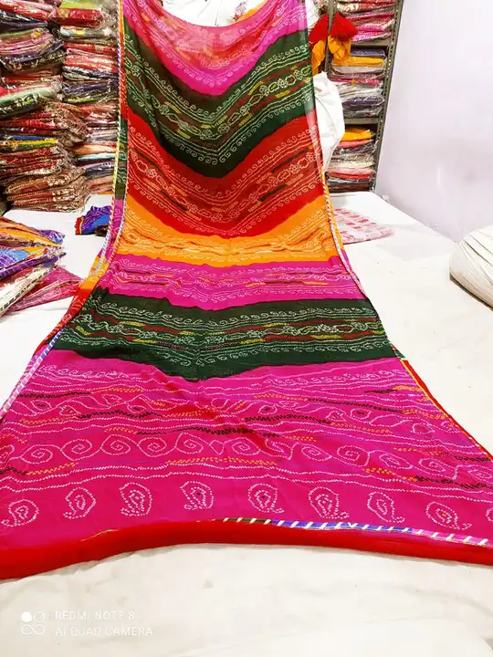 🌹 special  Georgette fabric of bhandej   saree*🌹🌹 nauranga color matching

👌👌 *Beautiful    all uploaded by Gotapatti manufacturer on 5/26/2023