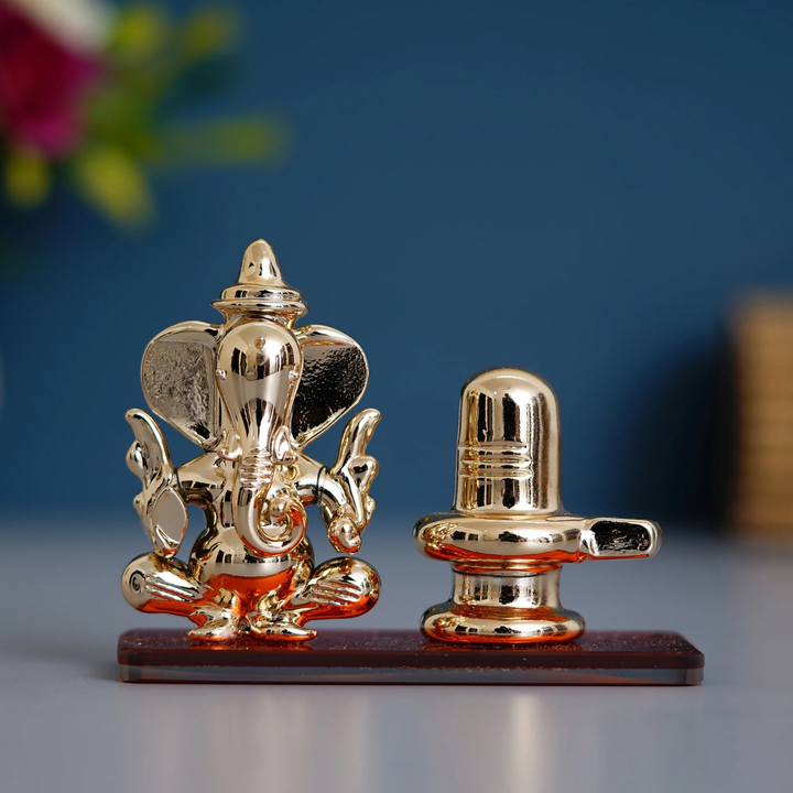 Orange Lord Ganesha with Shivling Crystal Statue for Home andre cardeshboard  uploaded by Home decor on 5/27/2023