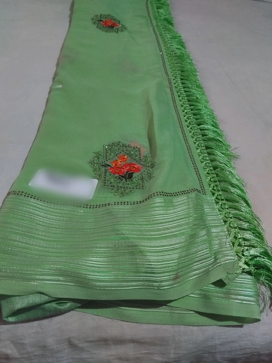 Georgette Saree With Fancy Weaving Border Siroski & Embroidery uploaded by Pallabi Enterprise on 5/27/2023