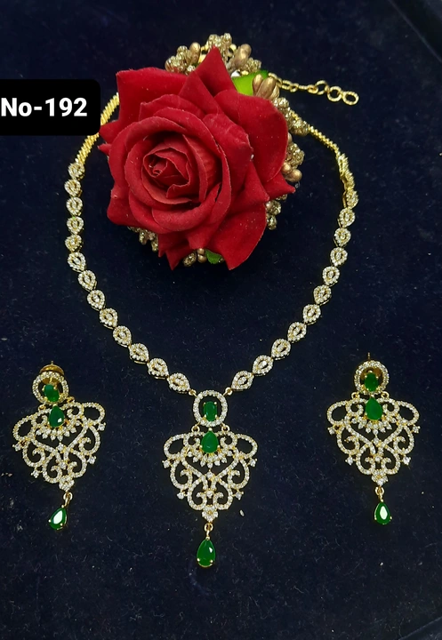 Gold Plated emerald cz necklace set uploaded by business on 5/28/2023