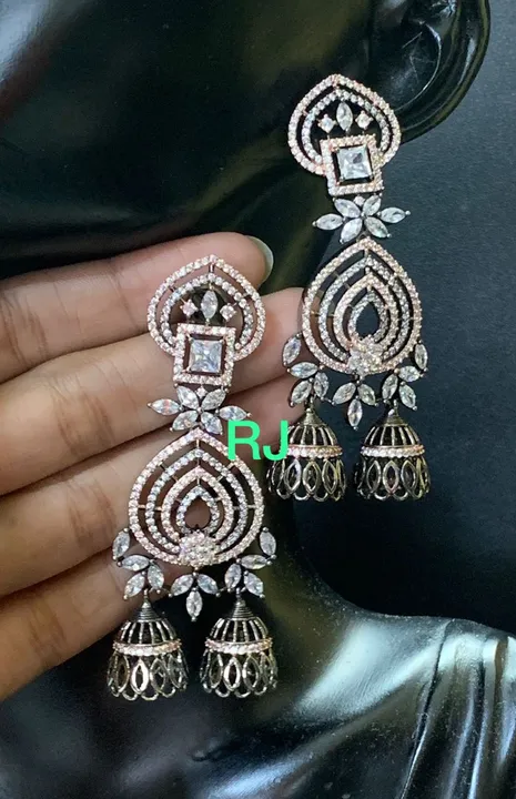 Dual tone plated diamond replica earrings  uploaded by ABHA on 5/28/2023