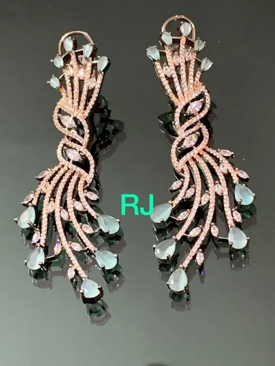 Dual tone plated diamond replica earrings uploaded by ABHA on 5/28/2023