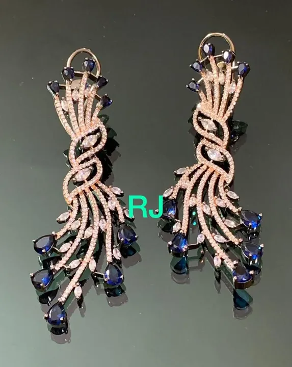 Dual tone plated diamond replica earrings uploaded by ABHA on 5/28/2023