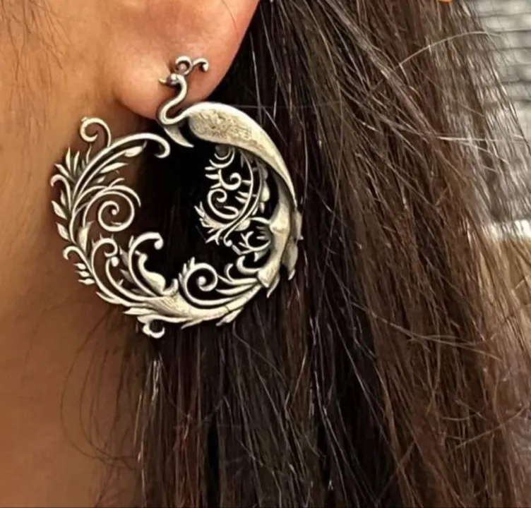Brass peacock earrings  uploaded by Deepsha Jewellery on 5/29/2023