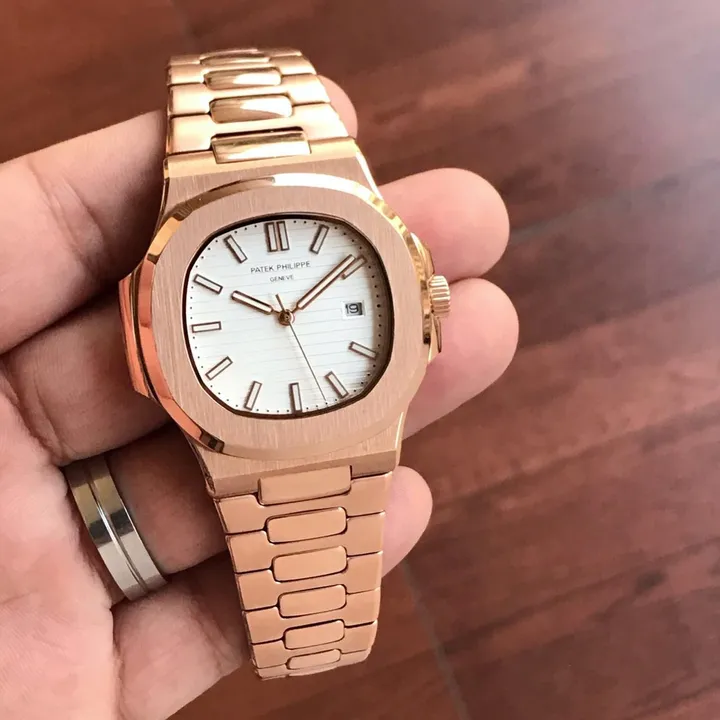 Post image This time with Live Picture and Video broadcast rose gold Patek 😍

✅ *The Patek Philippe Nautilus is the world's most desirable steel luxury sports watch which reinforces the brand’s commitment to creating spectacular timepieces with incredibly complicated movement.* ✅ 

🌟 Patek Philippe Nautilus Exclusively Solid &amp; Handsome Design Now Available &amp; Ready to ship today 🌟 

# Patek Philippe 
# For Men 
# 7AA Premium Collection 
# Model - Nautilus Ever Rosegold
# Dial Size - 42mm
# Features following -

- 12 Hour Analog 
- Original ridged dial
- Whole Rosegold Stainless Steel Case
- IPG Colour rating with No Fading and Rusting ✅
- Solid Metal Bracelet 
- *Exclusive Copper Brown Textured Dial* 
- Brand Embossing Time Screw
- Original Heavy Clasp Lock
- Water and Dust Resistant 
- *Non Comparable Original Japanese Battery Operated Machinery* ❤

✨ New Gold Nautilus with Price updated &amp; *Free Patek Philippe brand Name box* ✨

Available @ Rs 3499/- Free Shipping only