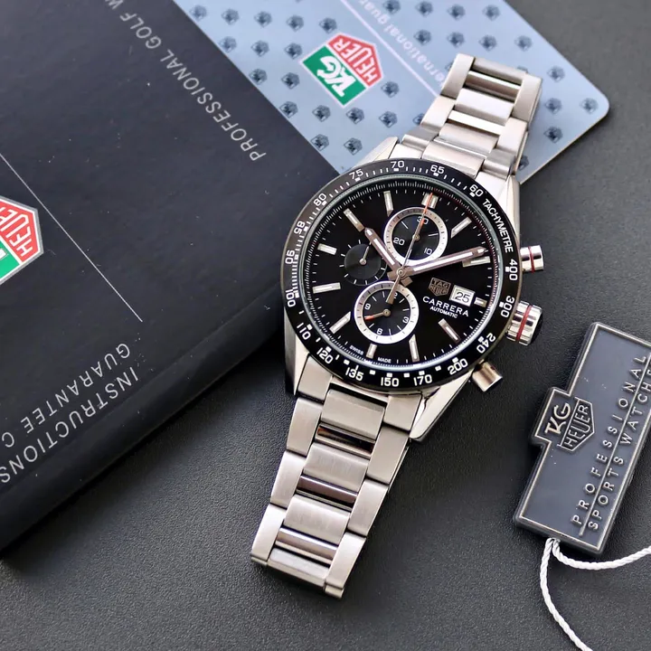 ✅ *A sporty TAG Heuer Carrera chronograph equipped with black ceramic fixed tachymeter bezel reflect uploaded by BSH Mega Store  on 5/29/2023