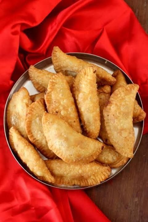 Post image Colorful festival is coming Let's celebrate  safely and enjoy with hygienic snacks. Order Homemade hygienic variety of Gujiya and mathri etc. For order DM or Contact -9711286096
