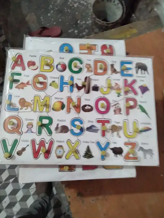Wooden alphabet picture  uploaded by business on 6/1/2023