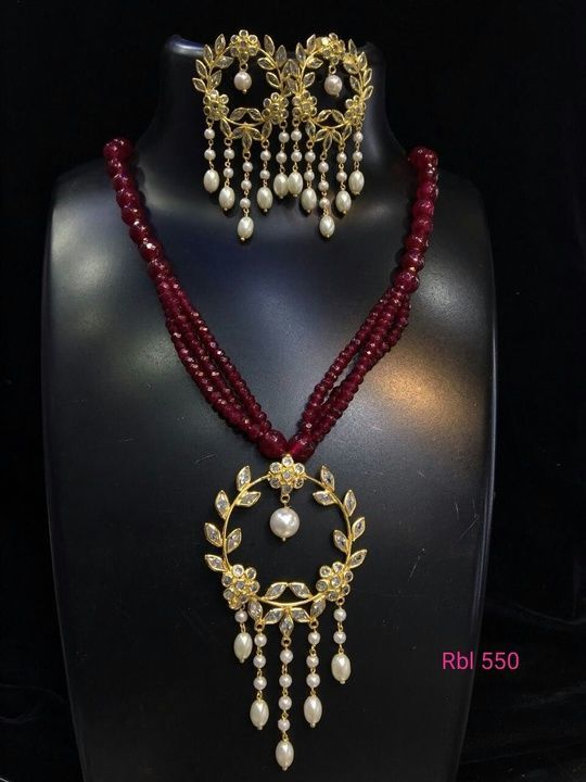 Gorgeous Polki pendal set with Red onex beads . uploaded by Reliable  on 3/12/2021