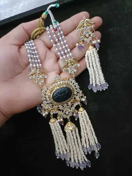 Long necklace with earrings uploaded by Mohit shopify on 5/30/2024