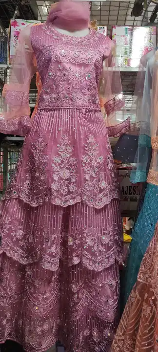 Net gown uploaded by A.ALI DRESSES  on 6/5/2023