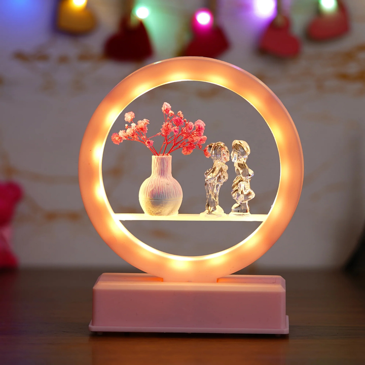🌹🌹SKU = KIVGIFTSET10525
Pink Flower Pot and Kissing Couple Light Showpiece
 uploaded by Home decor on 6/6/2023