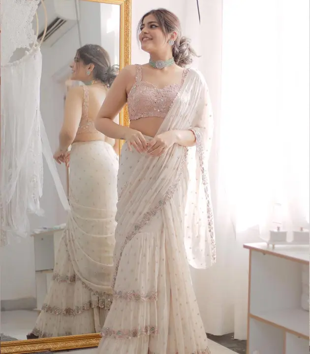 PRESENTING A SUPER HIT DESIGNER WHITE RAFAL SAREE WITH REAL MIRROR WORK uploaded by Fatema Fashion on 6/6/2023