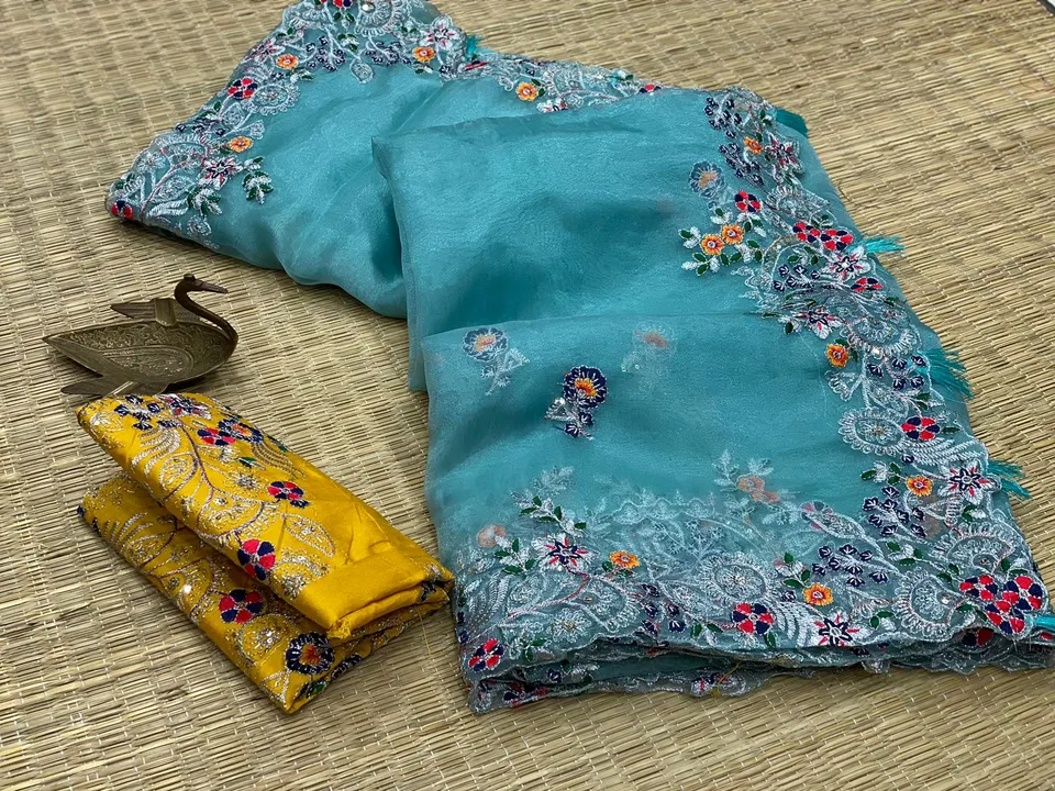 Sea blue colored organza silk embroidered saree uploaded by Celeb Styles on 6/7/2023