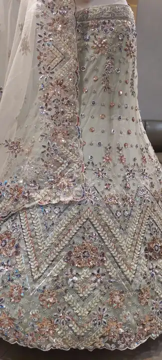 Party wear embroidery heavy lehenga  uploaded by Rajgharanaacouture on 6/7/2023