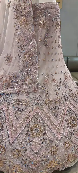 Party wear embroidery heavy lehenga  uploaded by Rajgharanaacouture on 6/7/2023