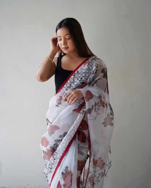Floral printed heavy border worked pure organza saree uploaded by Organza mall on 6/8/2023