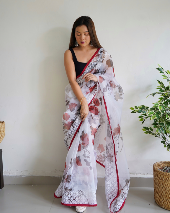 Floral printed heavy border worked pure organza saree uploaded by Organza mall on 6/8/2023