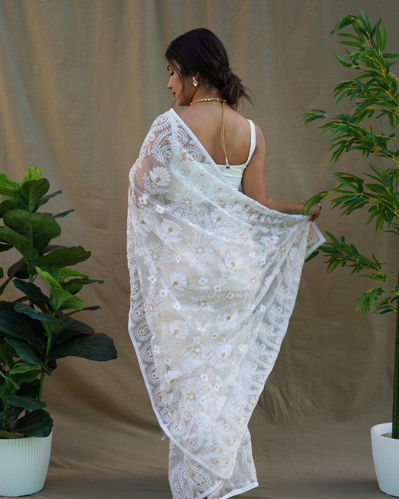 Ivory white heavy chikankari worked pure organza saree uploaded by Organza mall on 6/8/2023