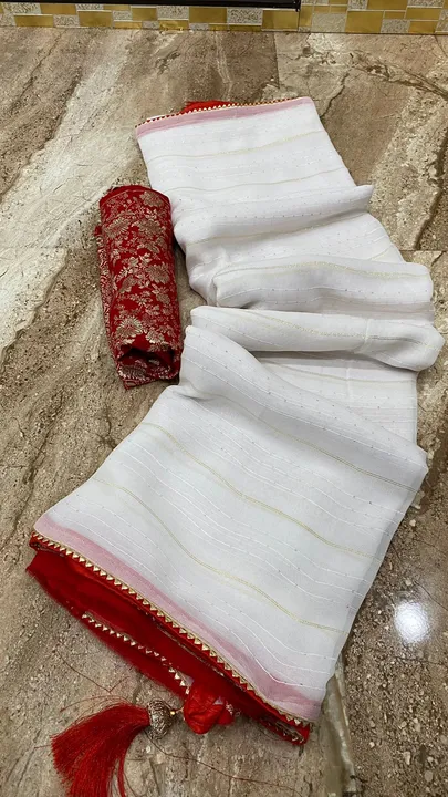 Fix price 

Super duper party wear saree
👌👌👌👌👌👌👌👌👌
👉pure jorjat gota border fabric uploaded by Gotapatti manufacturer on 6/8/2023