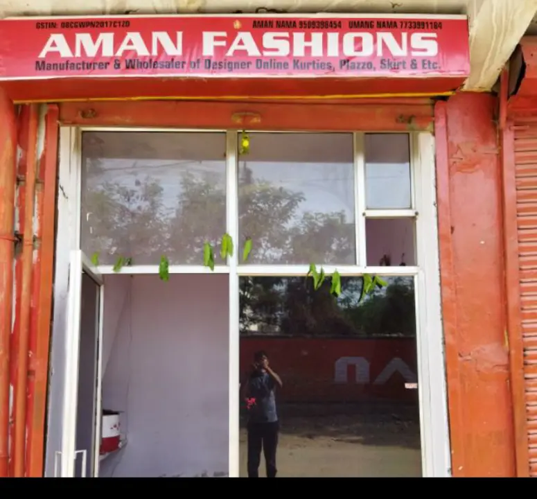Visiting card store images of Aman fashion's