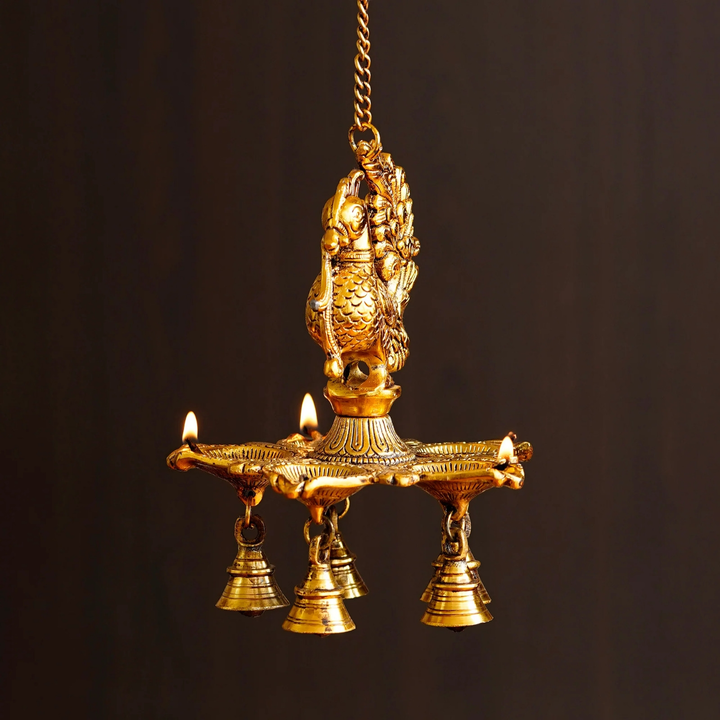 🪔🙏🏻🪔sku = DYADP60256
Five Wicks Decorative Peacock Diya With Bell Metal Wall Hanging With Chain
 uploaded by Home decor on 6/10/2023