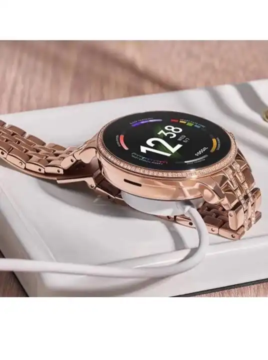 Golden smartwatch fossil uploaded by Fashion era on 6/11/2023