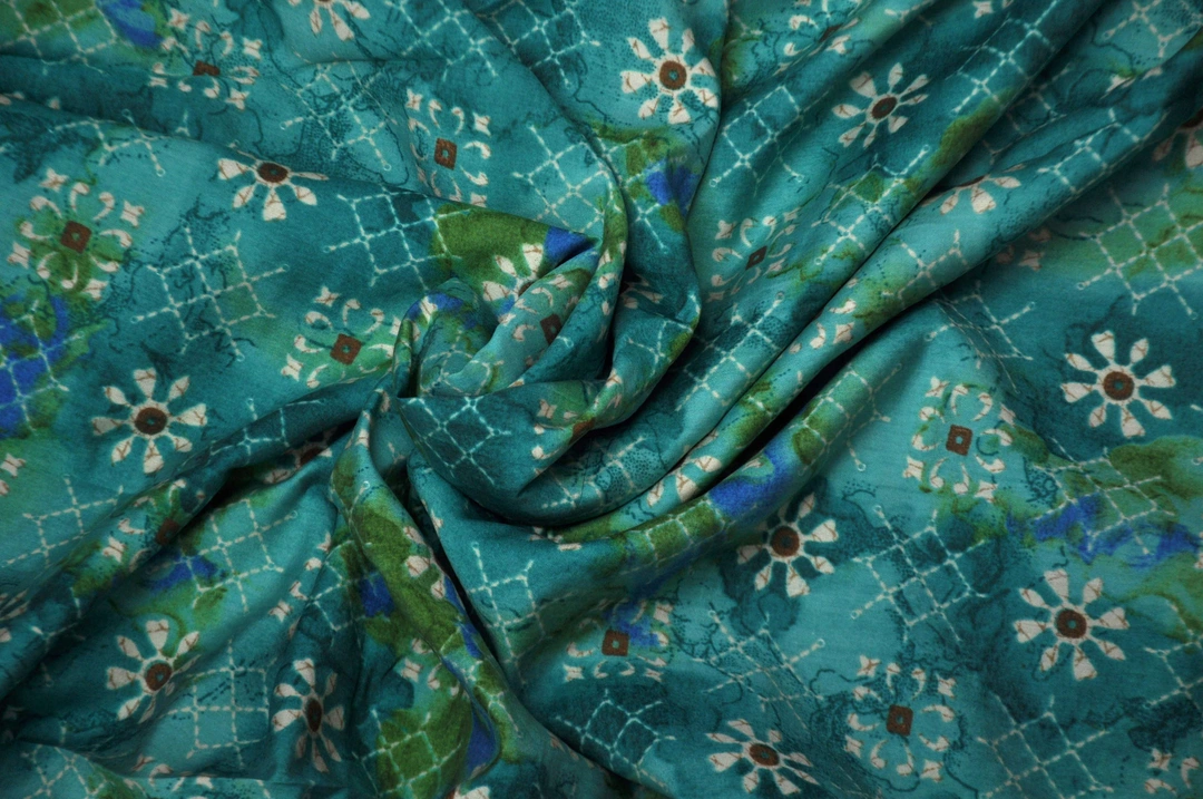 Blue With Gold Floral Muslin Printed Fabric  uploaded by Studio Lcx Fashion Pvt. Ltd. on 6/14/2023